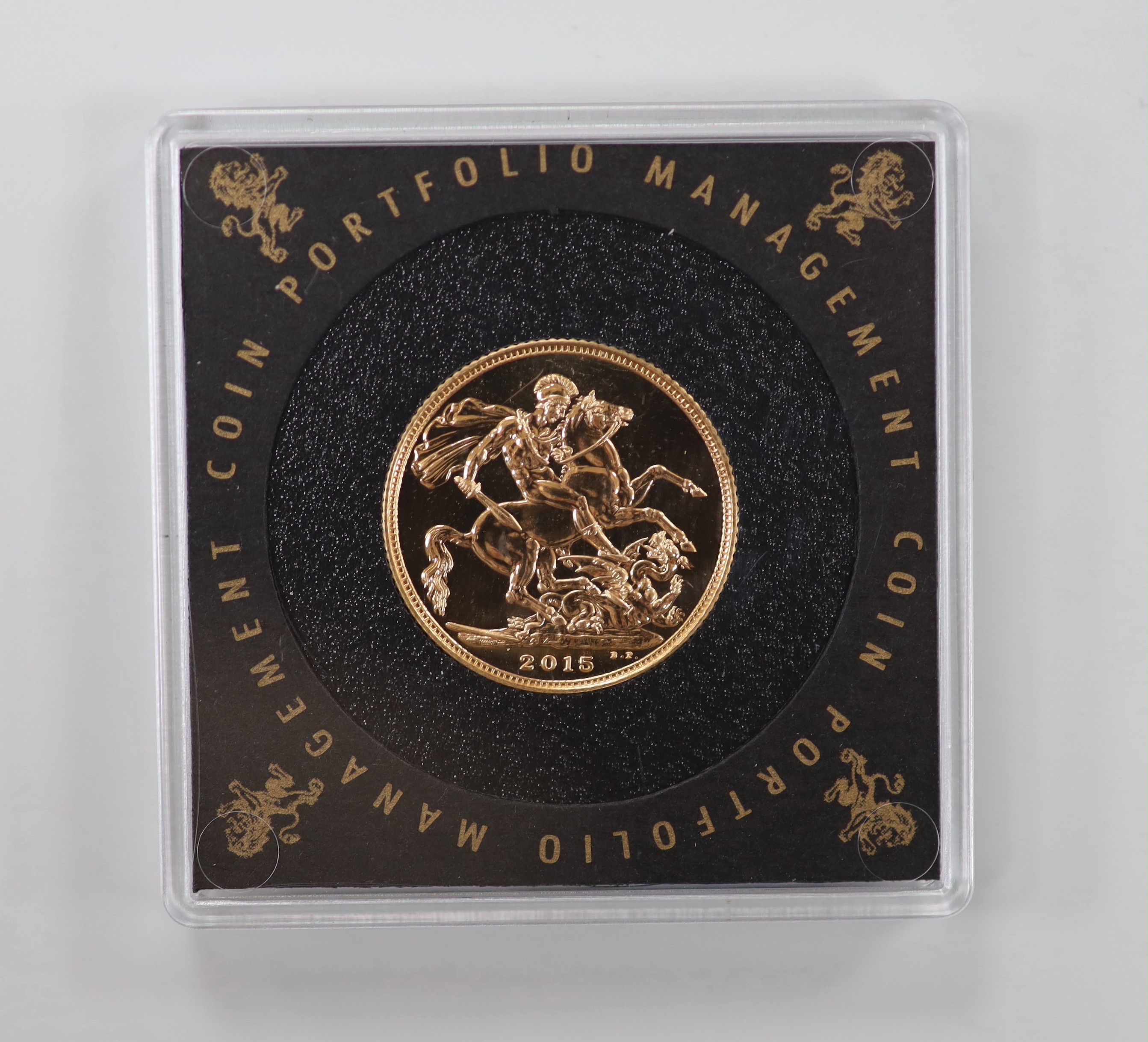 An Elizabeth II cased 2015 gold sovereign.